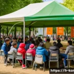 콩지래빗과 관련된 사회 공헌 활동 - A vibrant urban community event in a French neighborhood park featuring diverse families and childre...